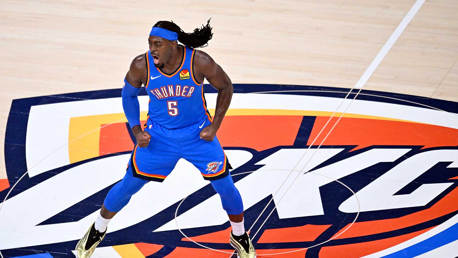 Oklahoma City Thunder guard Luguentz Dort (5) reacts in the second quarter against the San Antonio Spurs during game seven of the western conference finals for the 2026 NBA playoffs at Paycom Center.
