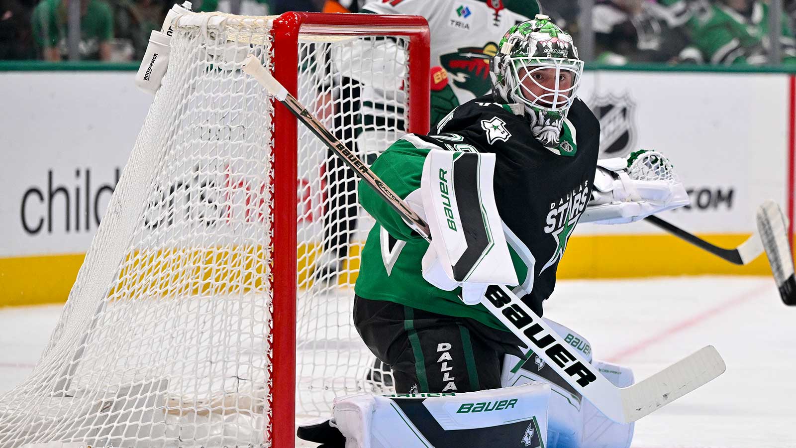 Dallas Stars goaltender Jake Oettinger (29) faces the Minnesota Wild attack in game five of the first round of the 2026 Stanley Cup Playoffs at American Airlines Center