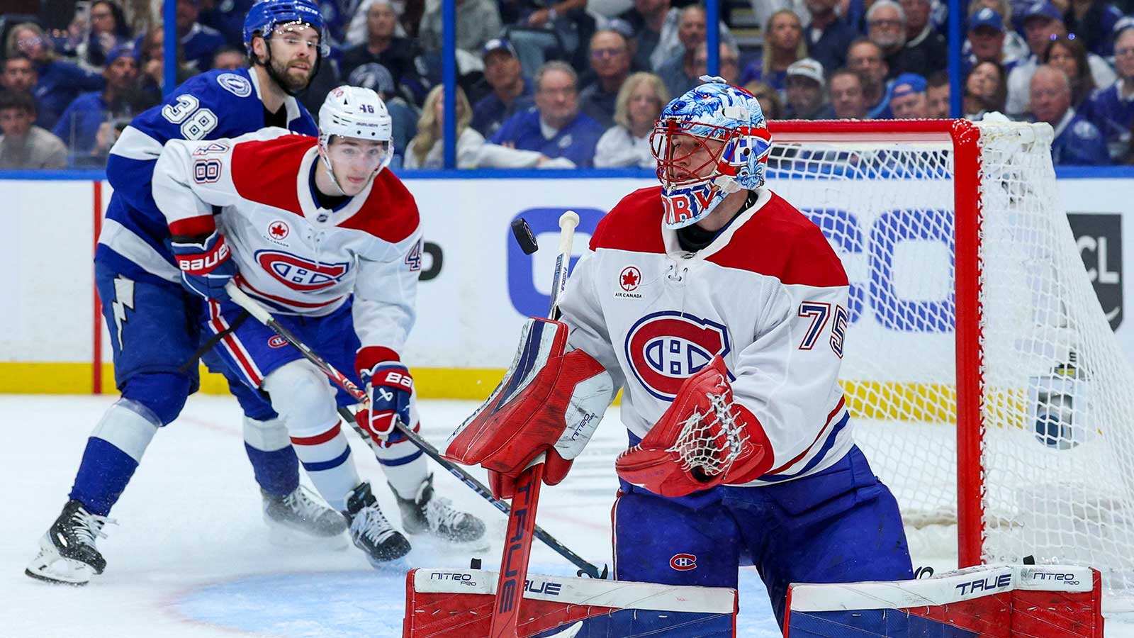 Montreal Canadiens goaltender Jakub Dobes (75) blocks a shot against the Tampa Bay Lightning in the first period during game five of the first round of the 2026 Stanley Cup Playoffs at Benchmark International Arena. 