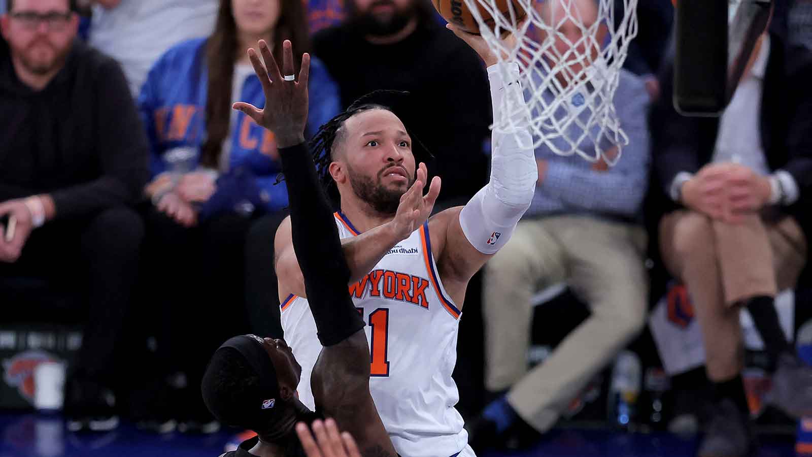 May 19, 2026; New York, New York, USA; New York Knicks guard Jalen Brunson (11) drives to the basket against Cleveland Cavaliers guard Dennis Schroder (8) during the fourth quarter of game one of the eastern conference finals during the 2026 NBA playoffs at Madison Square Garden