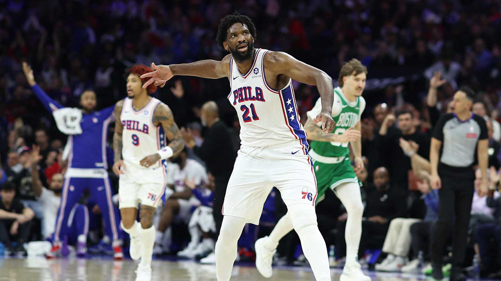 Philadelphia 76ers center Joel Embiid (21) reacts after his three pointer against the Boston Celtics during the second quarter at Xfinity Mobile Arena. 
