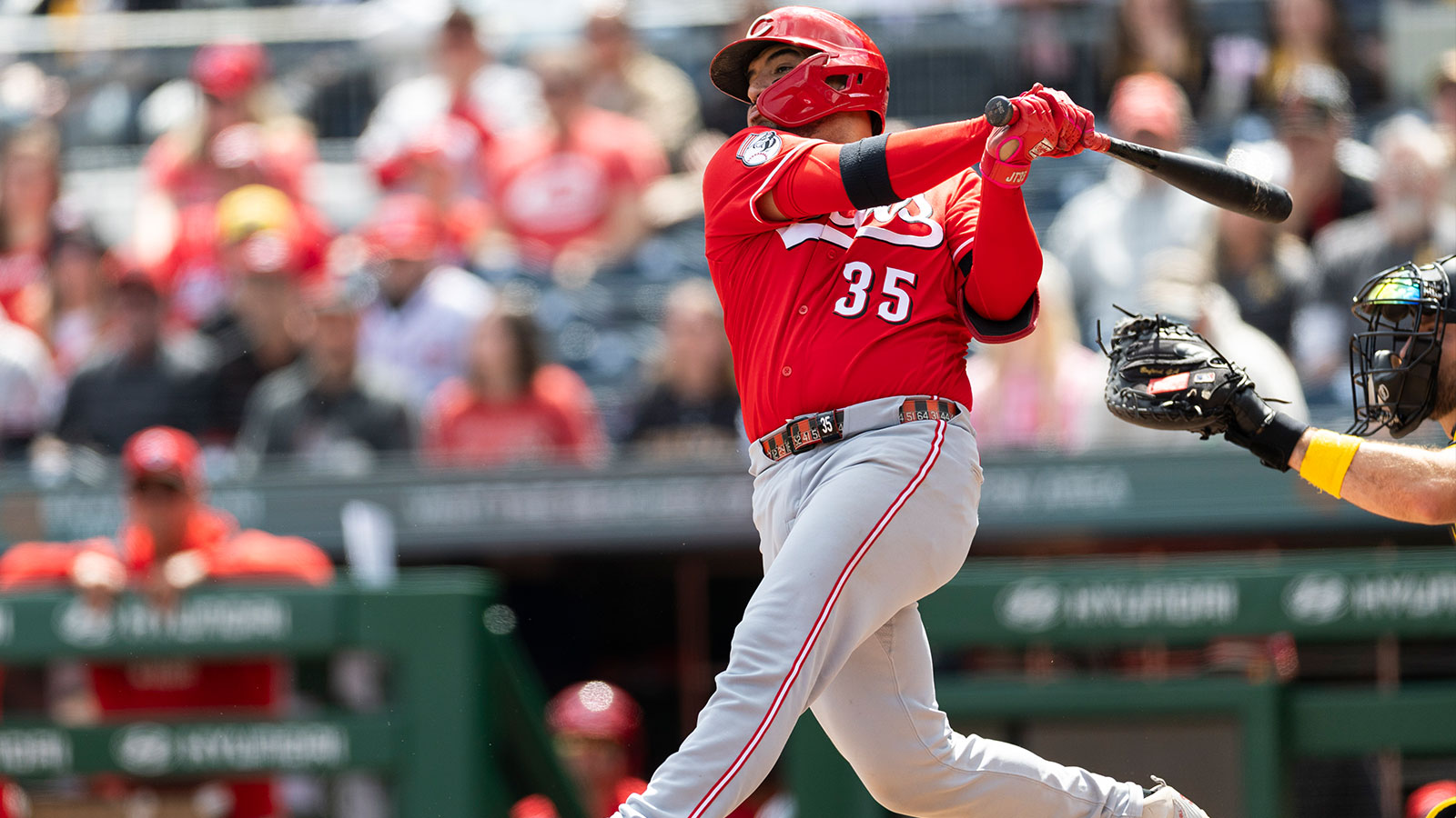 Cincinnati Reds catcher Jose Trevino (35) hits a double against the Pittsburgh Pirates during the eighth inning at PNC Park.