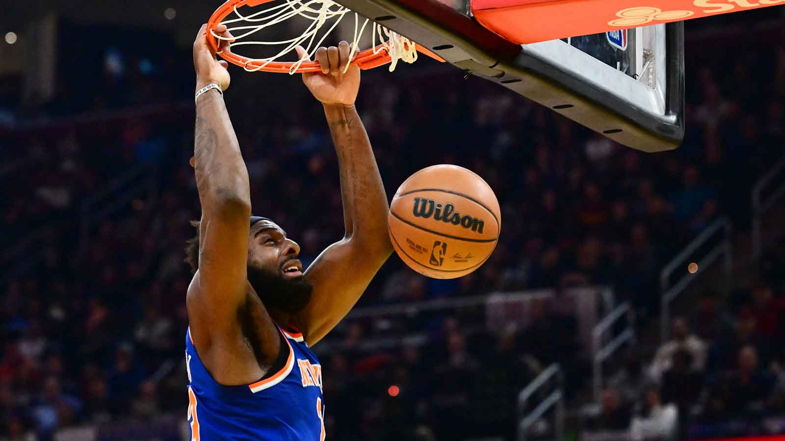 New York Knicks center Mitchell Robinson (23) dunks during the first half against the Cleveland Cavaliers at Rocket Arena.