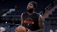 New York Knicks center Mitchell Robinson (23) warms up before a game against the Golden State Warriors at Madison Square Garden.