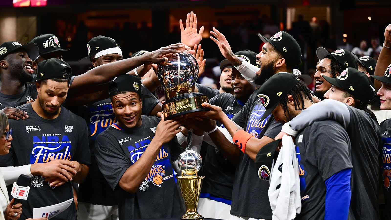 New York Knicks lift the 2026 Eastern Conference trophy after defeating the Cleveland Cavaliers in game four of the eastern conference finals for the 2026 NBA playoffs at Rocket Arena.