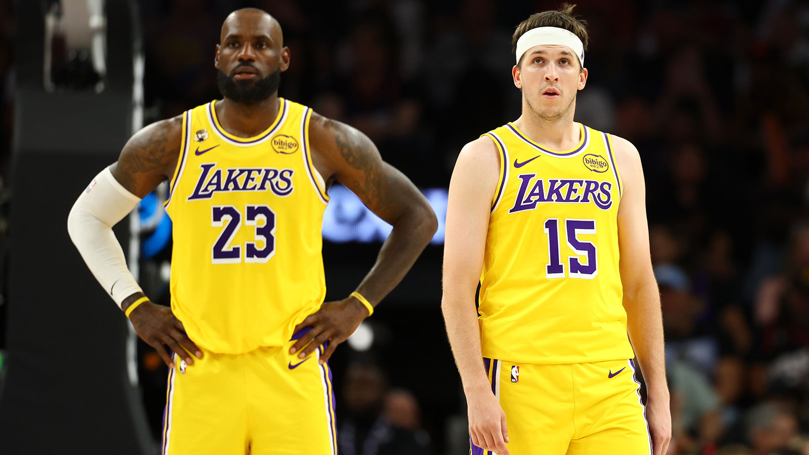 Los Angeles Lakers guard Austin Reaves (15) with forward LeBron James (23) against the Phoenix Suns at Mortgage Matchup Center. 