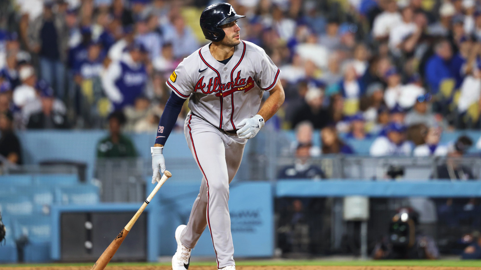  Atlanta Braves first baseman Matt Olson (28) hits a single during the seventh inning against the Los Angeles Dodgers at Dodger Stadium.