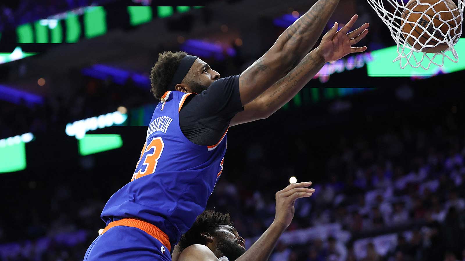 Knicks star Mitchell Robinson’s Joel Embiid poster crashes NY’s heartwarming ‘dad duty’ post