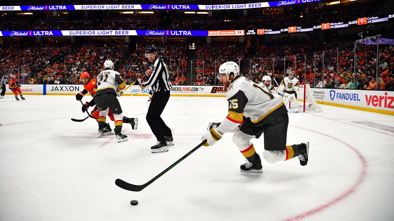 Vegas Golden Knights defenseman Noah Hanifin (15) moves the puck against the Anaheim Ducks during the second period in game three of the second round of the 2026 Stanley Cup Playoffs at Honda Center.