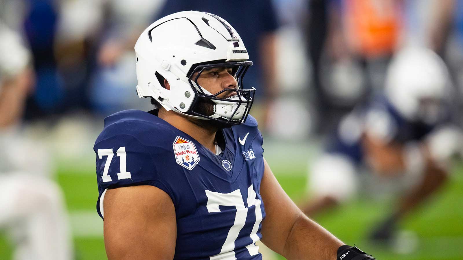 Penn State Nittany Lions offensive lineman Olaivavega Ioane (71) against the Boise State Broncos during the Fiesta Bowl