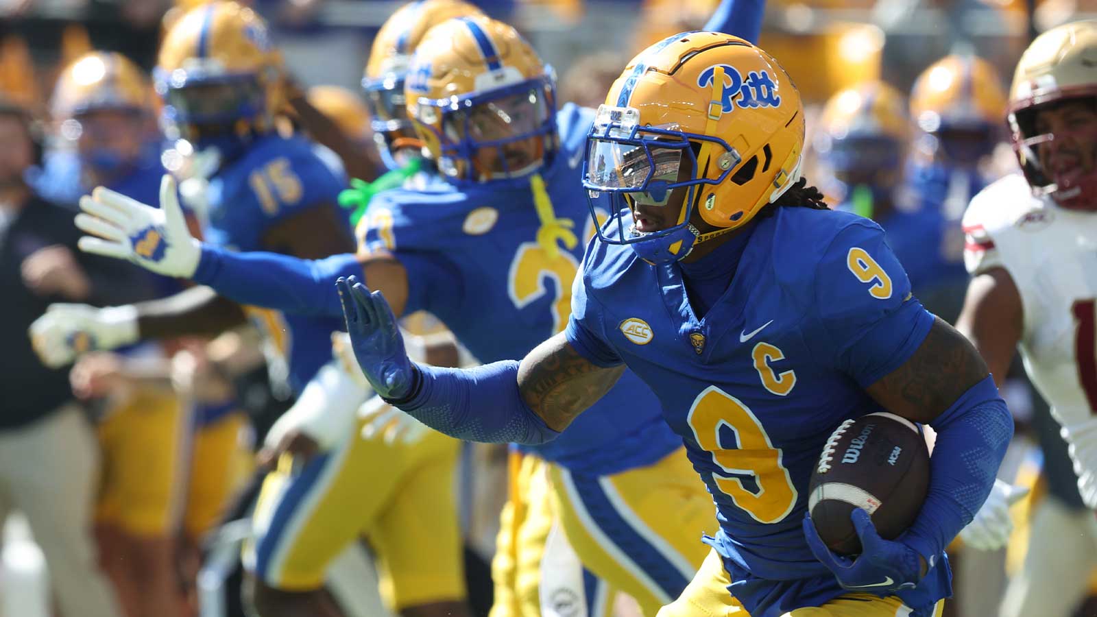 Pittsburgh Panthers linebacker Kyle Louis (9) runs after fumble recovery against the Boston College Eagles
