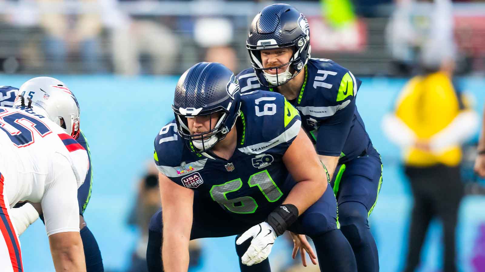 Seattle Seahawks center Jalen Sundell (61) prepares to snap the ball to quarterback Sam Darnold (14) against the New England Patriots during Super Bowl LX at Levi's Stadium