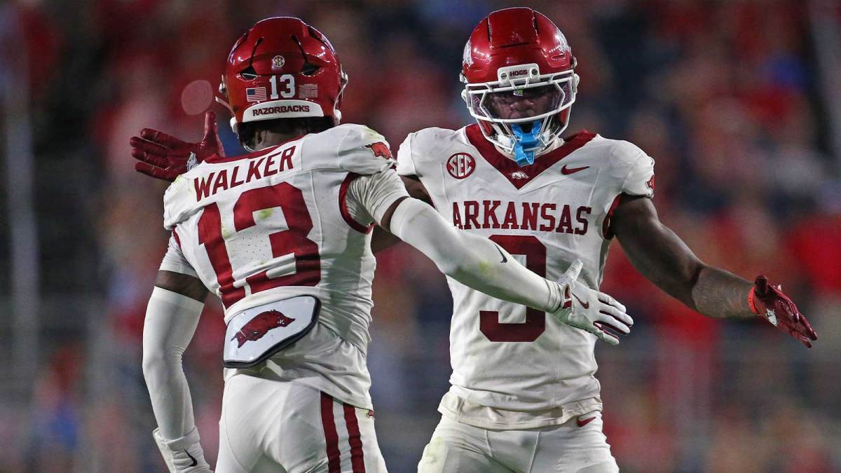 Arkansas Razorback defensive back Larry Worth III (3) and defensive back Kani Walker (13) react during the second quarter against the Mississippi Rebels at Vaught-Hemingway Stadium.