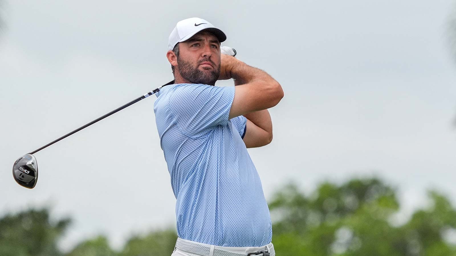 Scottie Scheffler watches his tee shot on the second hole hole during the final round of the Cadillac Championship golf tournament.