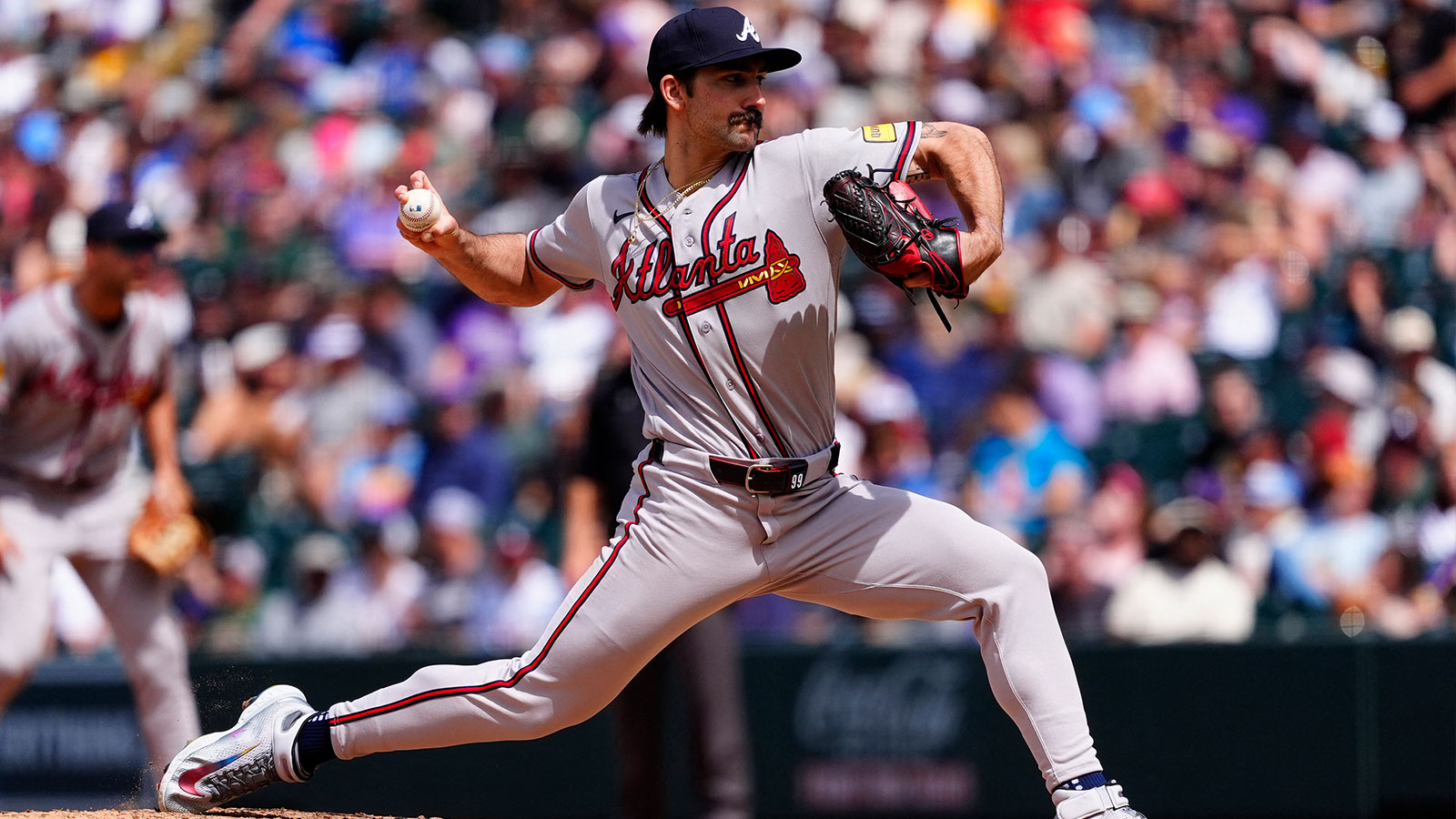 Atlanta Braves starting pitcher Spencer Strider (99) delivers a pitch in the fourth inning against the Colorado Rockies at Coors Field.