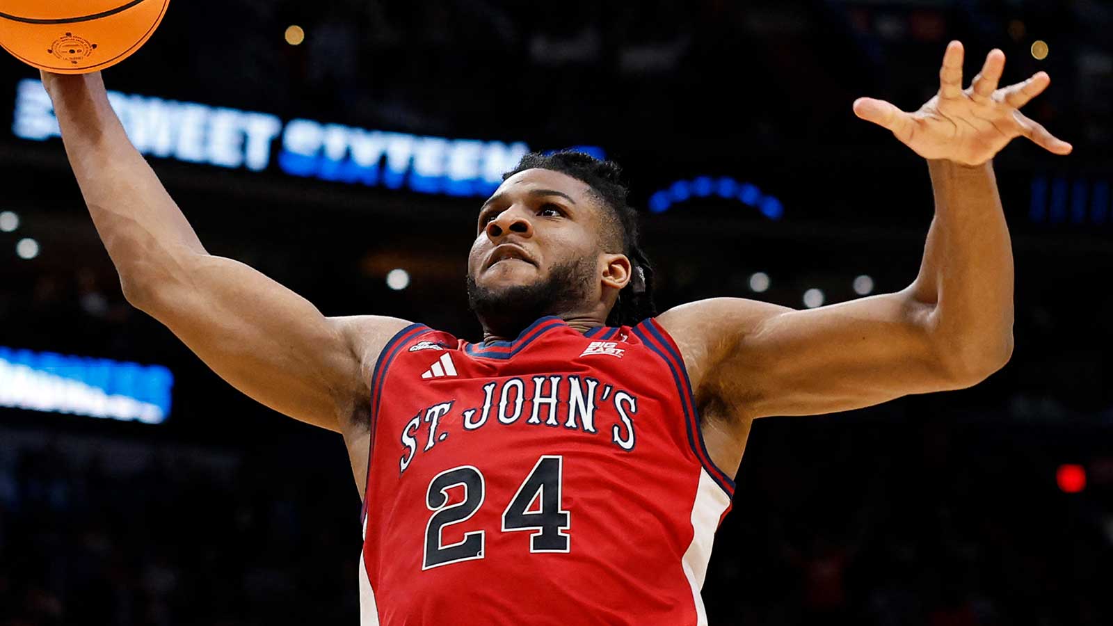 St. John's Red Storm forward Zuby Ejiofor (24) goes in for a dunk against the Duke Blue Devils in the second half during a Sweet Sixteen game of the East Regional of the men's 2026 NCAA Tournament at Capital One Arena.