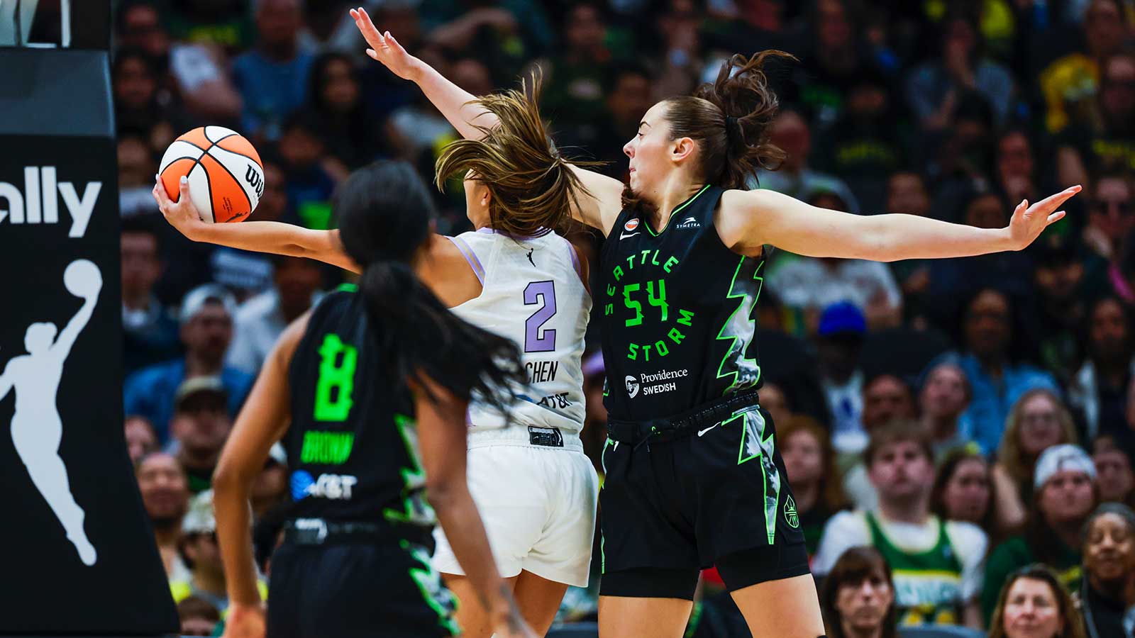 Seattle Storm forward MacKenzie Holmes (54) defends a layup attempt by Golden State Valkyries guard Kaitlyn Chen (2) during the third quarter at Climate Pledge Arena.