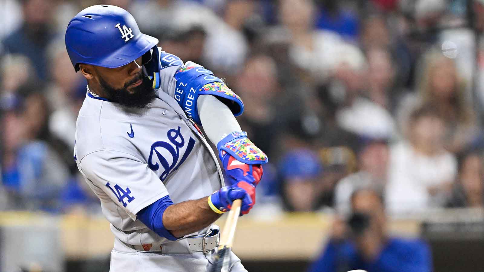  Los Angeles Dodgers left fielder Teoscar Hernandez (37) hits a double during the fifth inning against the San Diego Padres at Petco Park. 