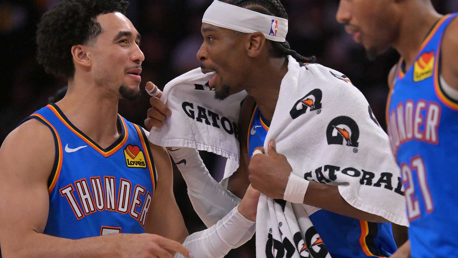 Thunder guard Jared McCain (3) and Oklahoma City Thunder guard Shai Gilgeous-Alexander (2) celebrate in the final minutes of game three of the second round of the 2026 NBA Playoffs against the Los Angeles Lakers at Crypto.com Arena