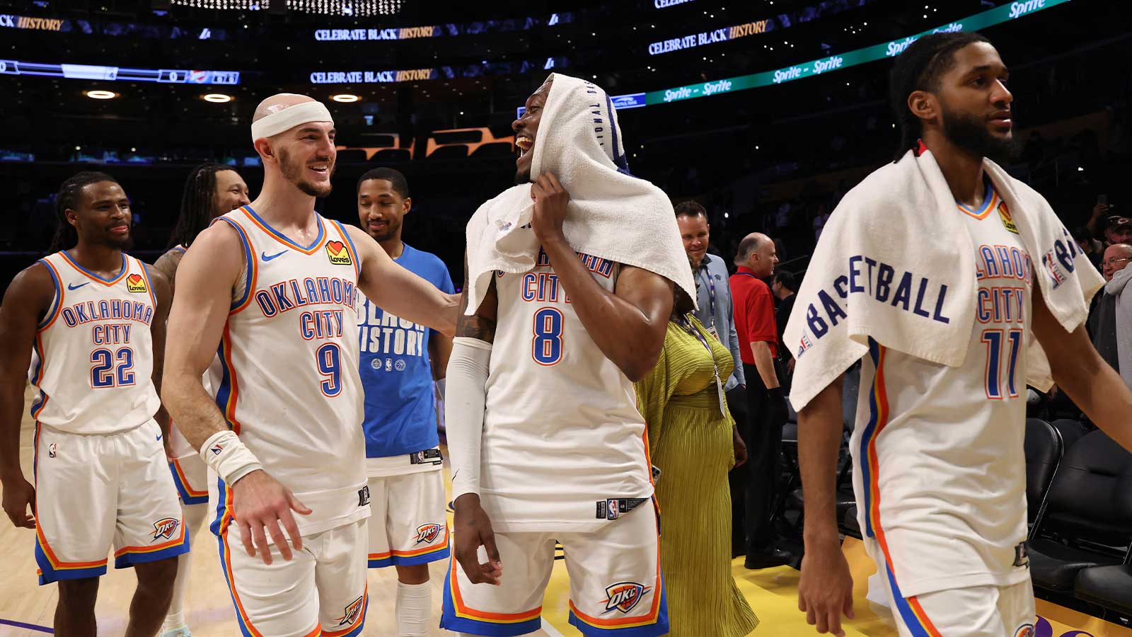 Thunder guard Jalen Williams (8) celebrates with guard Alex Caruso (9) after defeating the Los Angeles Lakers 119-110 at Crypto.com Arena