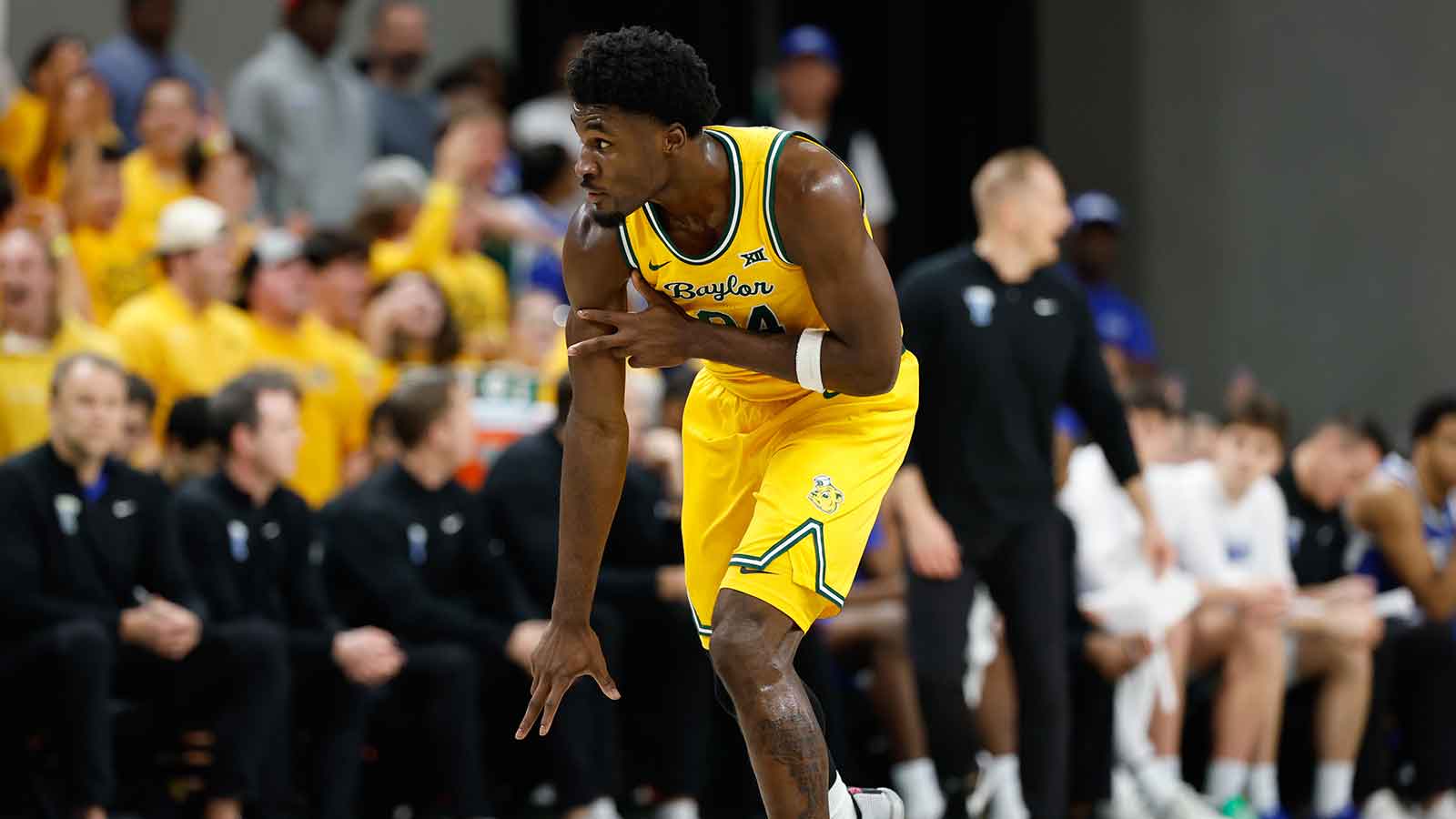 Baylor Bears guard Tounde Yessoufou (24) reacts after scoring a three-point basket against the BYU Cougars during the first half at Paul and Alejandra Foster Pavilion.