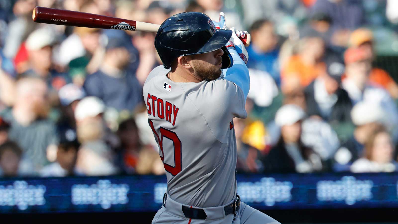 Boston Red Sox shortstop Trevor Story (10) hits a single in the first inning against the Detroit Tigers at Comerica Park. 