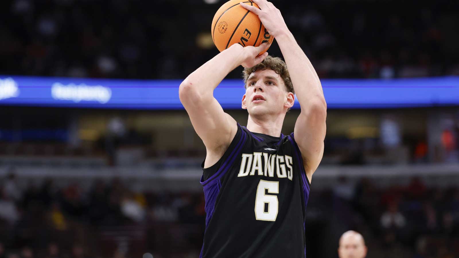 Washington Huskies forward Hannes Steinbach (6) shoots a free throw against the Wisconsin Badgers during the first half at United Center. 