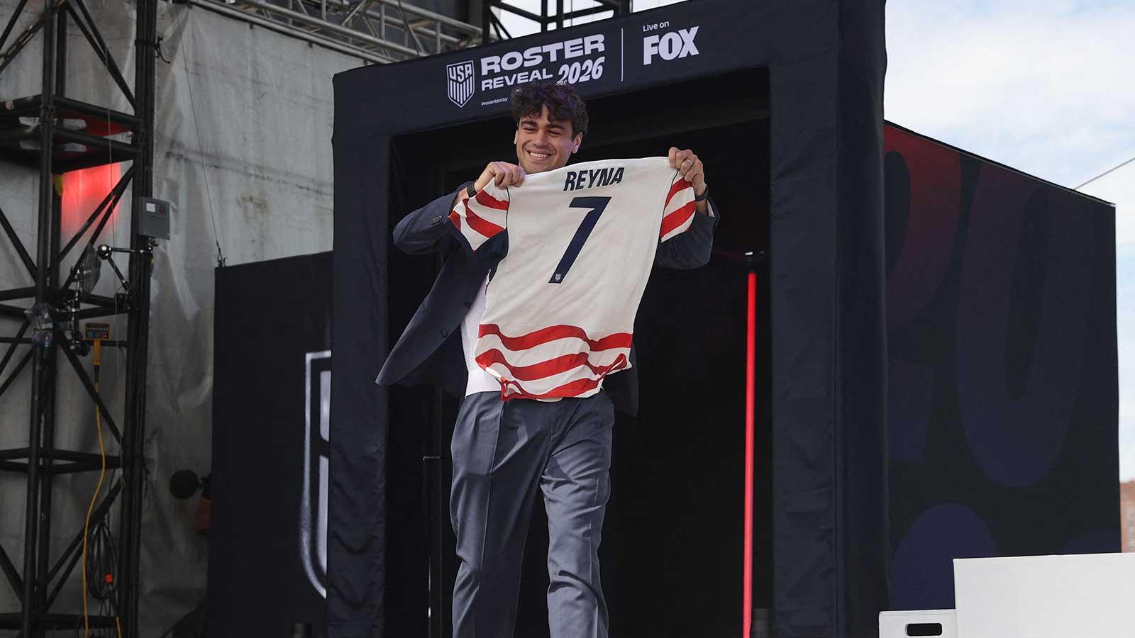 Gio Reyna walks on stage during the United States men's national team roster reveal for the 2026 FIFA World Cup at The Rooftop at Pier 17.