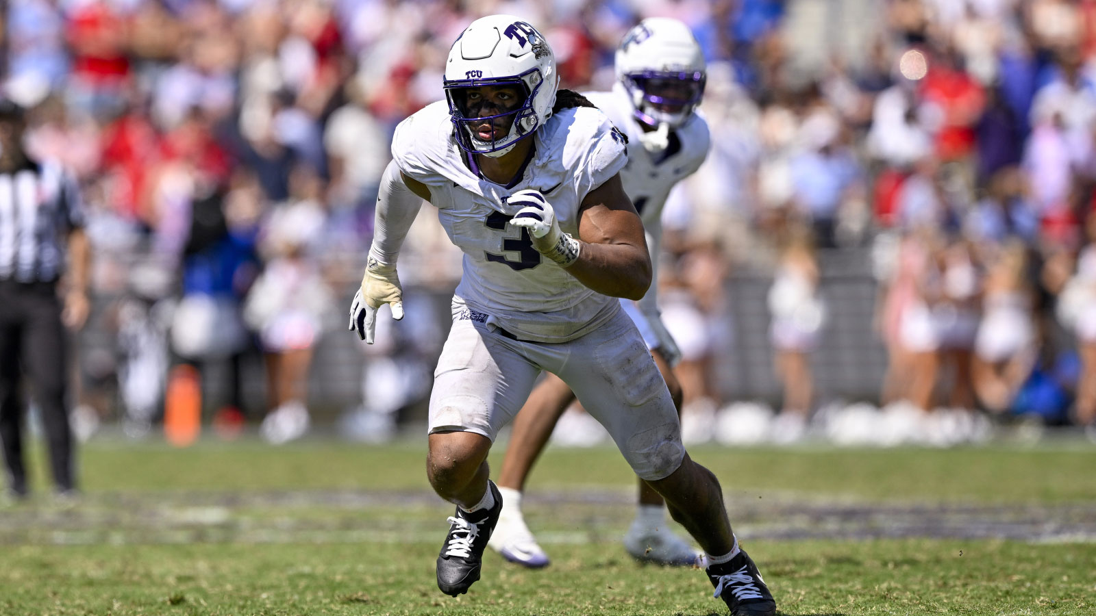 TCU Horned Frogs linebacker Kaleb Elarms-Orr (3) rushes the line during the game between the TCU Horned Frogs and the SMU Mustangs at Amon G. Carter Stadium. 