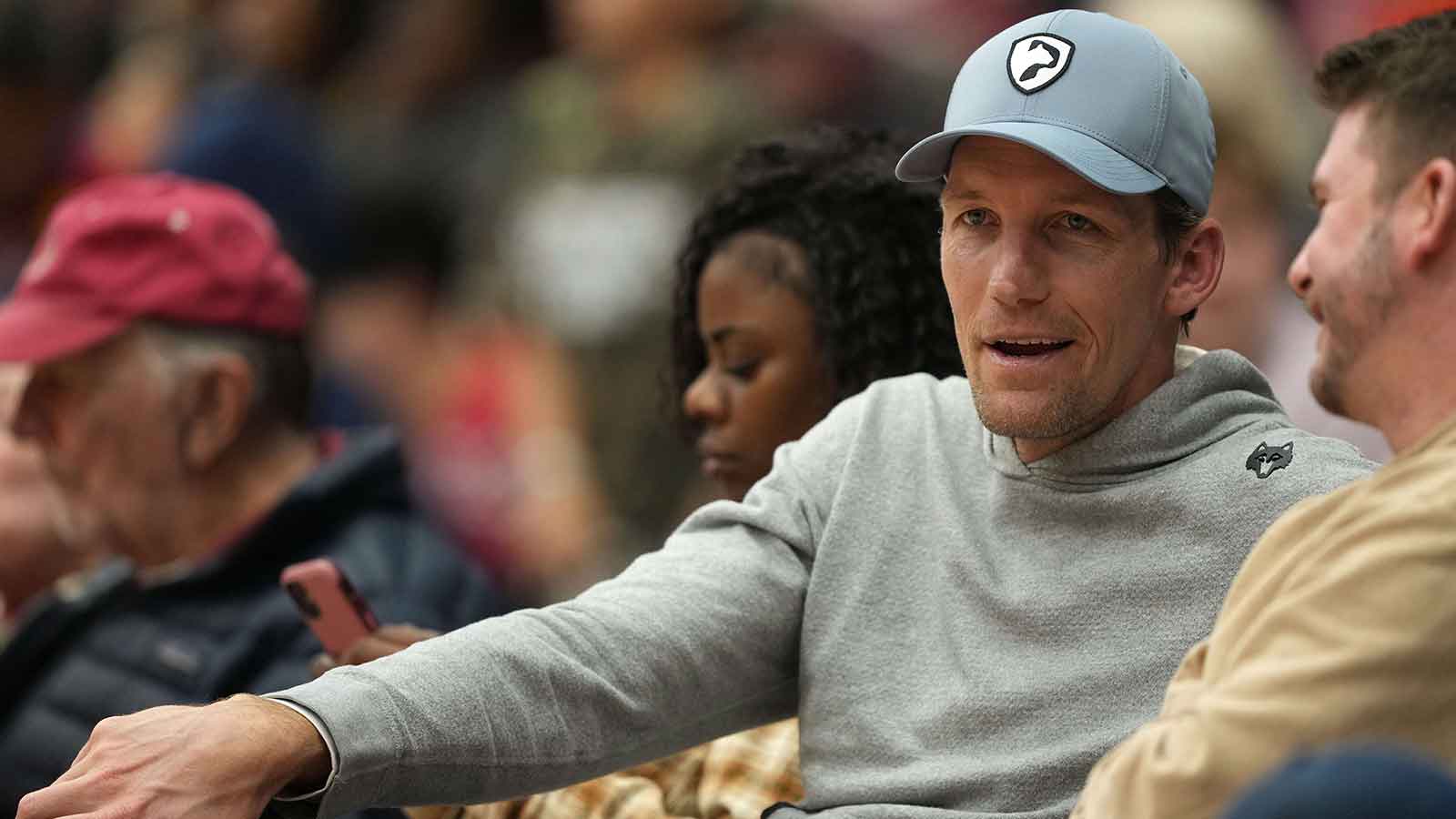 Golden State Warriors general manager Mike Dunleavy Jr. sits courtside during the second half of the game between the Stanford Cardinal and the CSUN Matadors at Maples Pavilion
