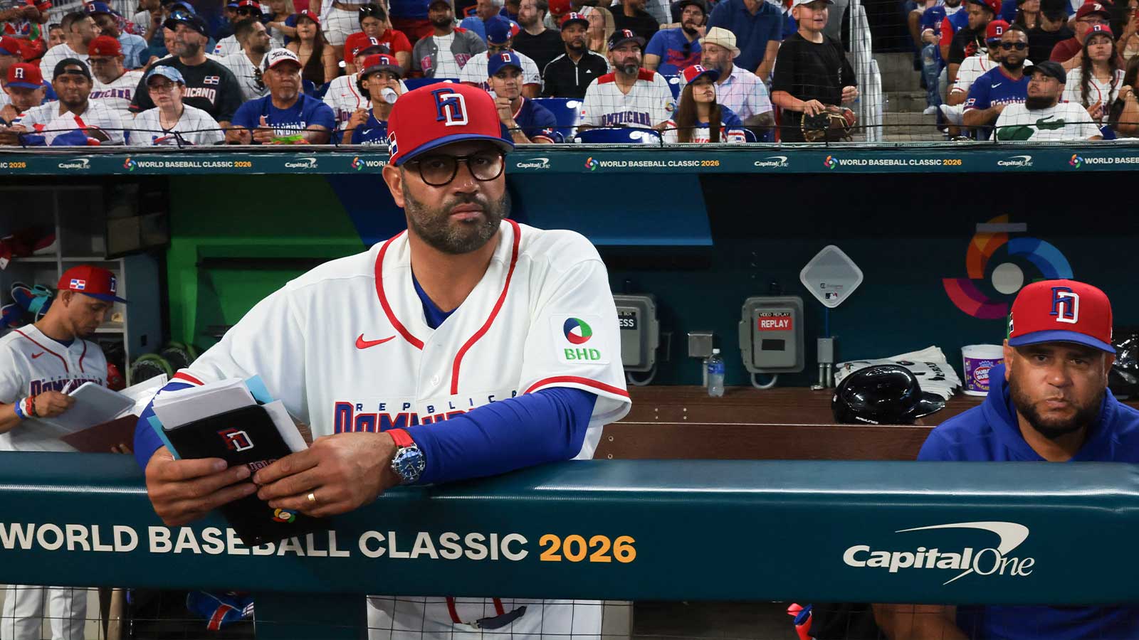 Dominican Republic manager Albert Pujols (5) watches from the dugout against the Netherlands during the sixth inning at loanDepot Park. 