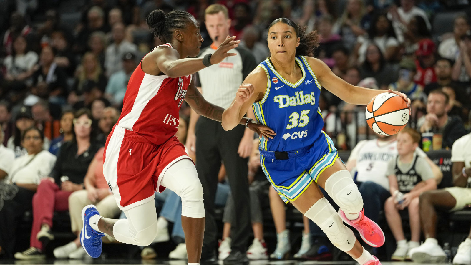 https://wp.clutchpoints.com/wp-content/uploads/2026/06/Azzi-Fudd-dribbling-against-Jewell-Loyd.jpg