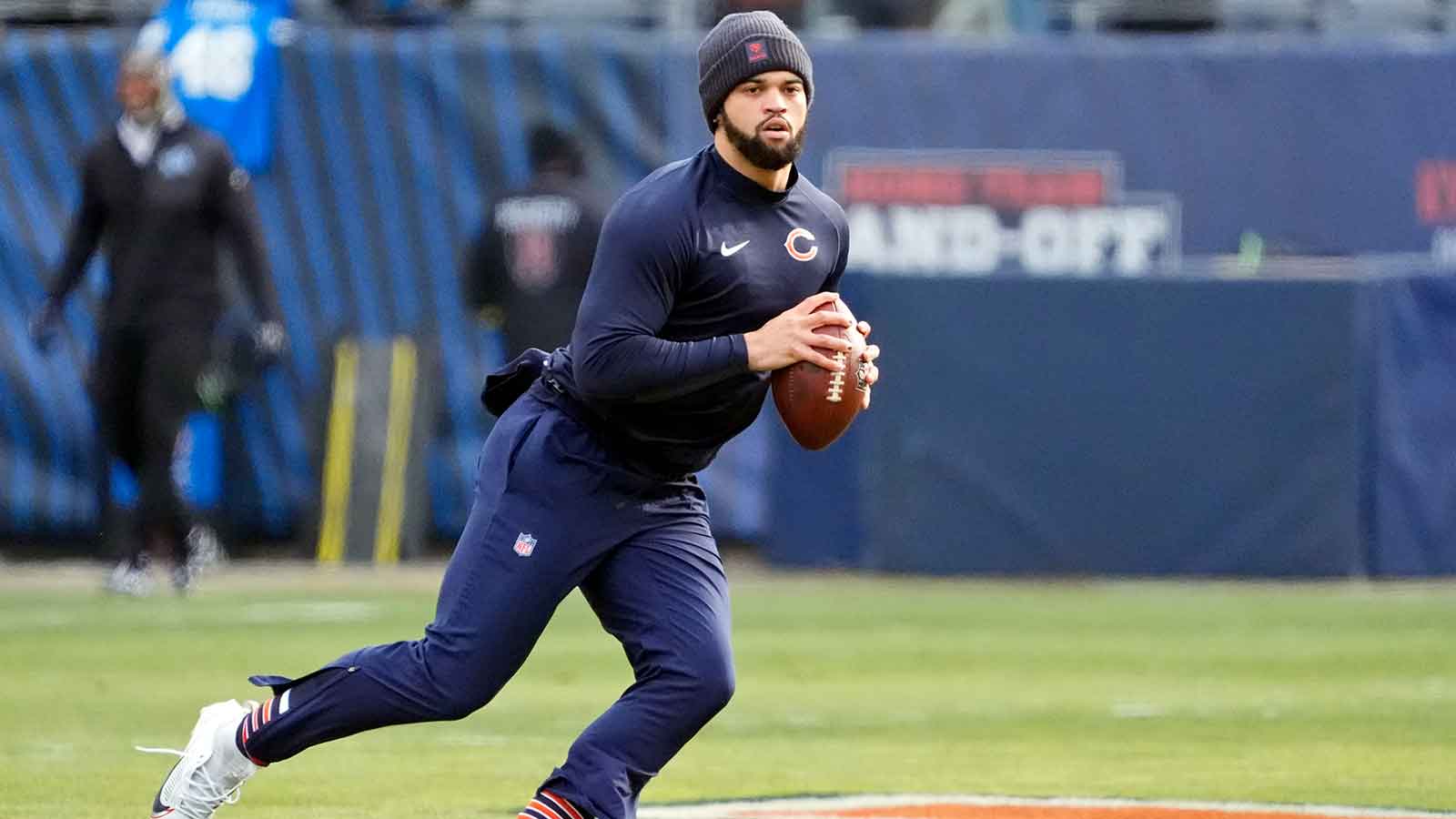 Chicago Bears quarterback Caleb Williams (18) warms up before the game between the Chicago Bears and the Detroit Lions at Soldier Field.