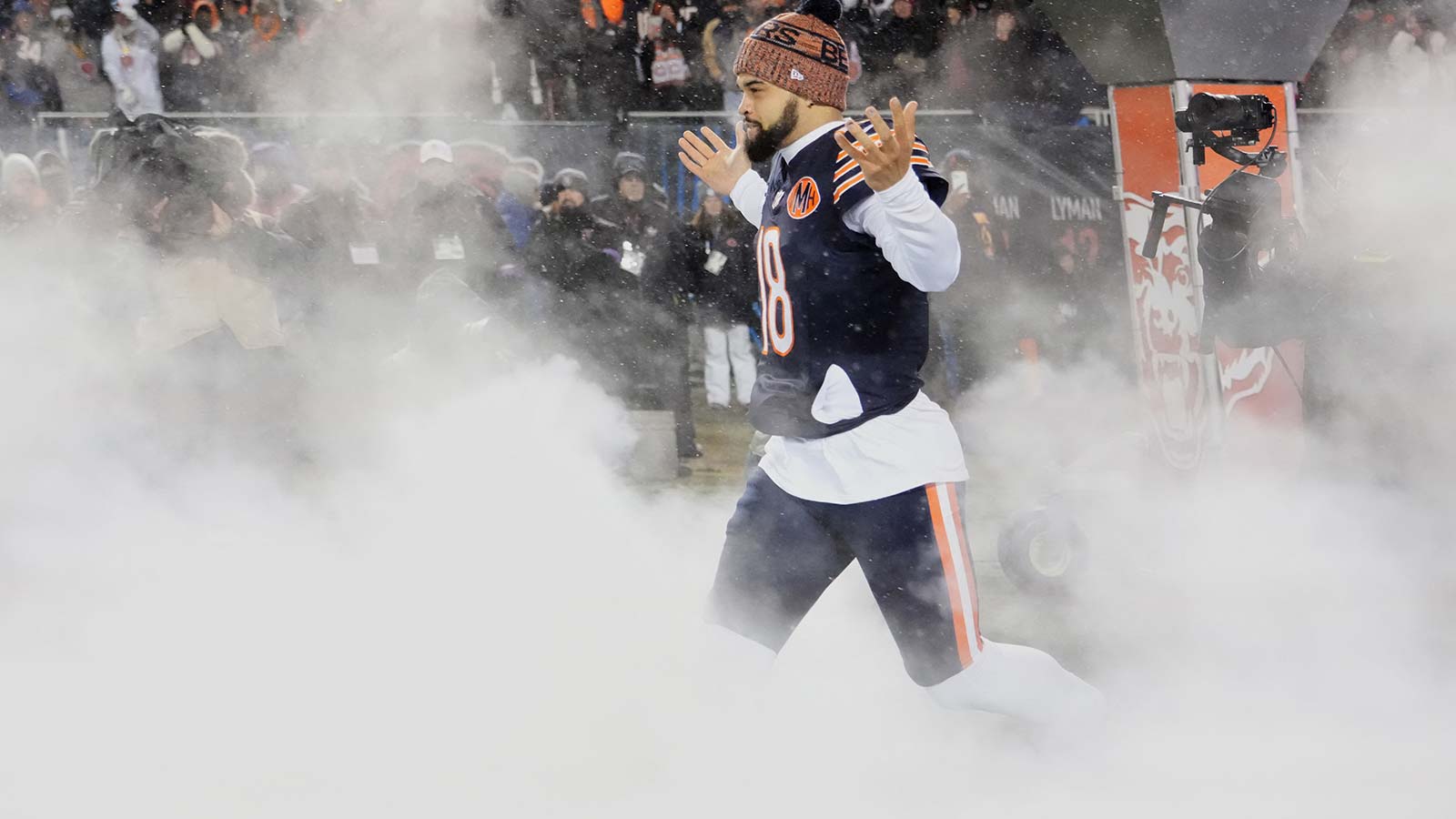 Chicago Bears quarterback Caleb Williams (18) runs onto the field during player introductions before an NFC Divisional Round game against the Los Angeles Rams at Soldier Field.