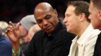 Phoenix Suns former player Charles Barkley (left) and team owner Mat Ishbia sit courtside against the Minnesota Timberwolves during an NBA Cup game at Mortgage Matchup Center.