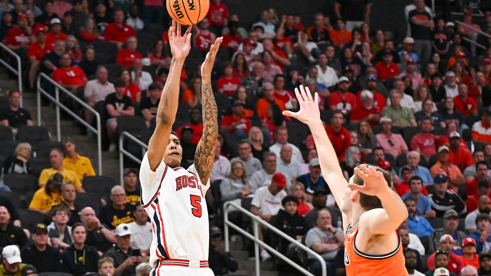 Houston Cougars center Chris Cenac Jr. (5) shoots the ball against the Illinois Fighting Illini in the first half during a Sweet Sixteen game of the South Regional of the men's 2026 NCAA Tournament at Toyota Center.
