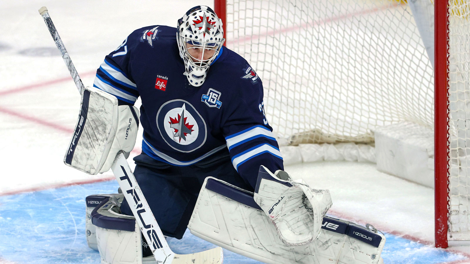 Winnipeg Jets goaltender Connor Hellebuyck (37) makes a skate save against the Vegas Golden Knights in the third period at Canada Life Centre.