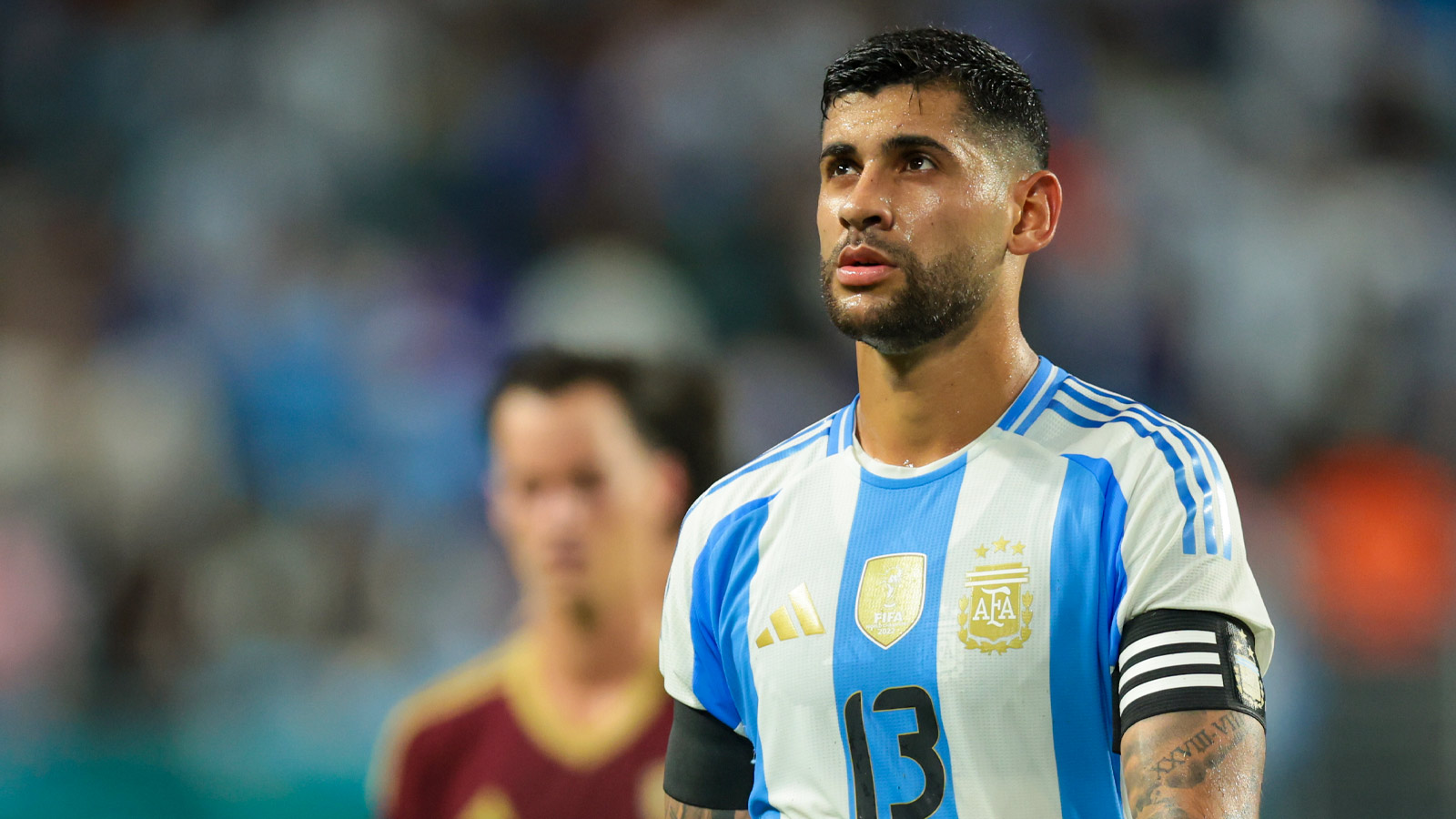 Argentina defender Cristian Romero (13) looks on after the first half against Venezuela at Hard Rock Stadium. 