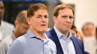 Dallas Mavericks minority owner Mark Cuban (left) and Mavericks governor Patrick Dumont (right) looks on a press conference at the Dallas Mavericks Practice Facility.
