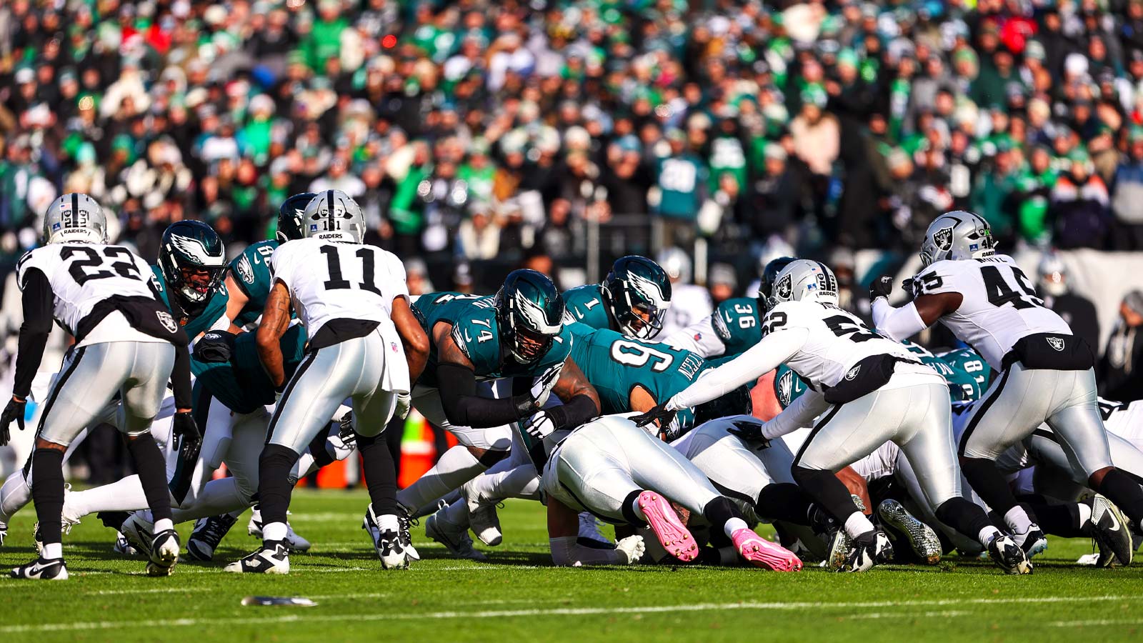 Philadelphia Eagles quarterback Jalen Hurts (1) plays the tush push for a first down against the Las Vegas Raiders during the first quarter at Lincoln Financial Field.