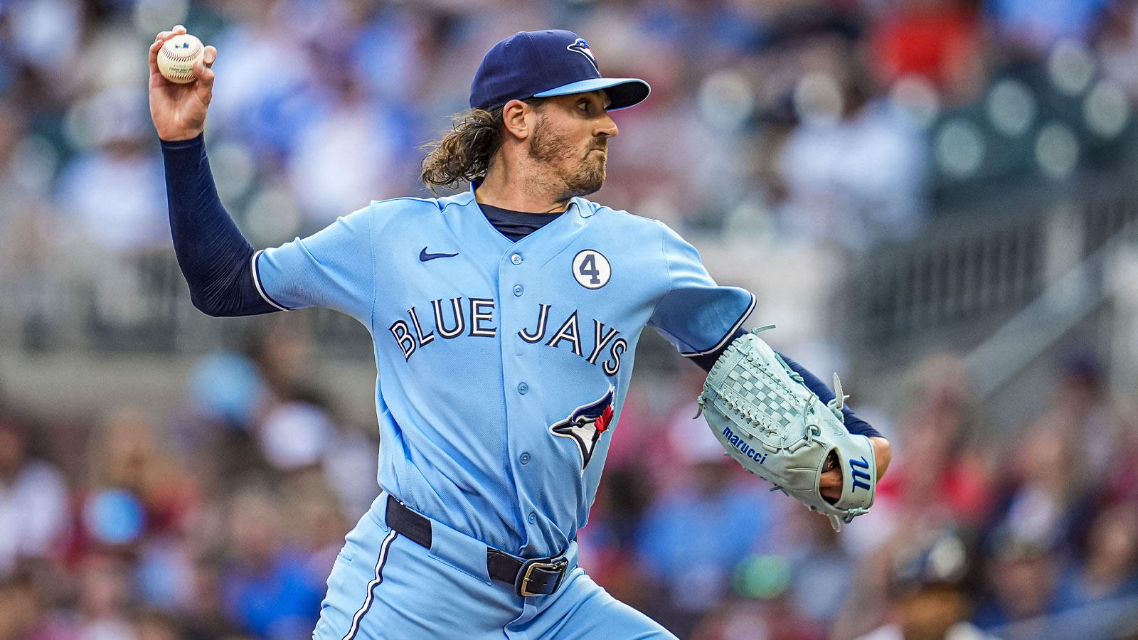 Blue Jays’ Kevin Gausman shotguns beer with Leafs star on stage at Luke Combs concert hours before start vs. Orioles