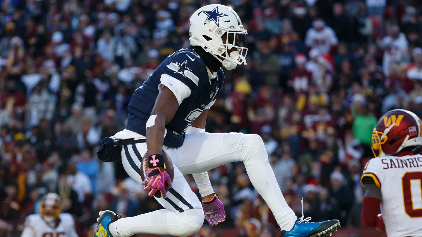 Dallas Cowboys wide receiver George Pickens (3) celebrates after a play against the Washington Commanders during the first half at Northwest Stadium. 