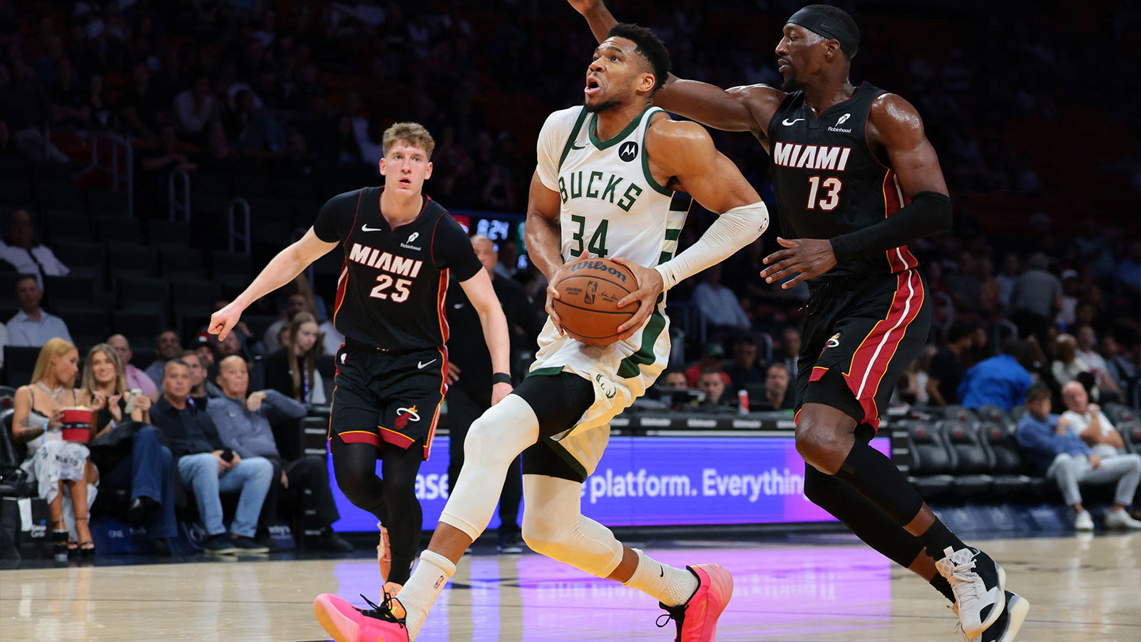 Milwaukee Bucks forward Giannis Antetokounmpo (34) drives to the basket against Miami Heat center Bam Adebayo (13) during the first quarter at Kaseya Center.