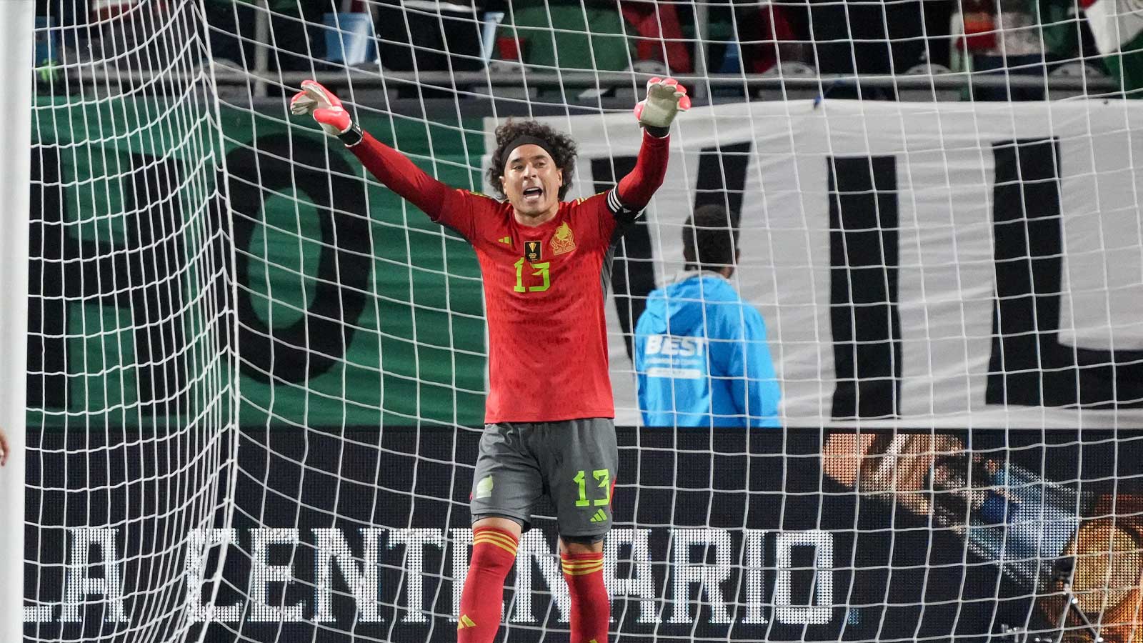 Mexico goalkeeper Guillermo Ochoa (13) yells instructions to his teammates during the second half against Ghana at Bank of America Stadium. 