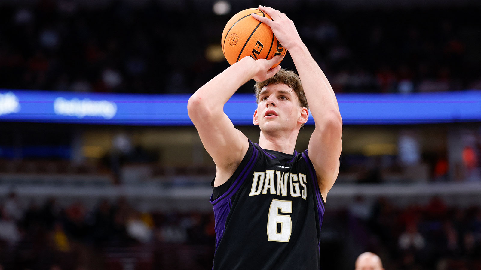 Washington Huskies forward Hannes Steinbach (6) shoots a free throw against the Wisconsin Badgers during the first half at United Center. 