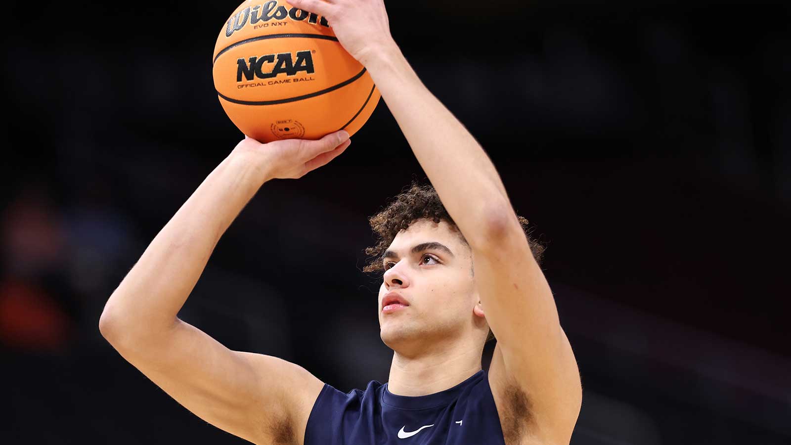 Illinois Fighting Illini guard Keaton Wagler (23) warms up before an Elite Eight game of the South Regional of the men's 2026 NCAA Tournament against the Iowa Hawkeyes at Toyota Center.