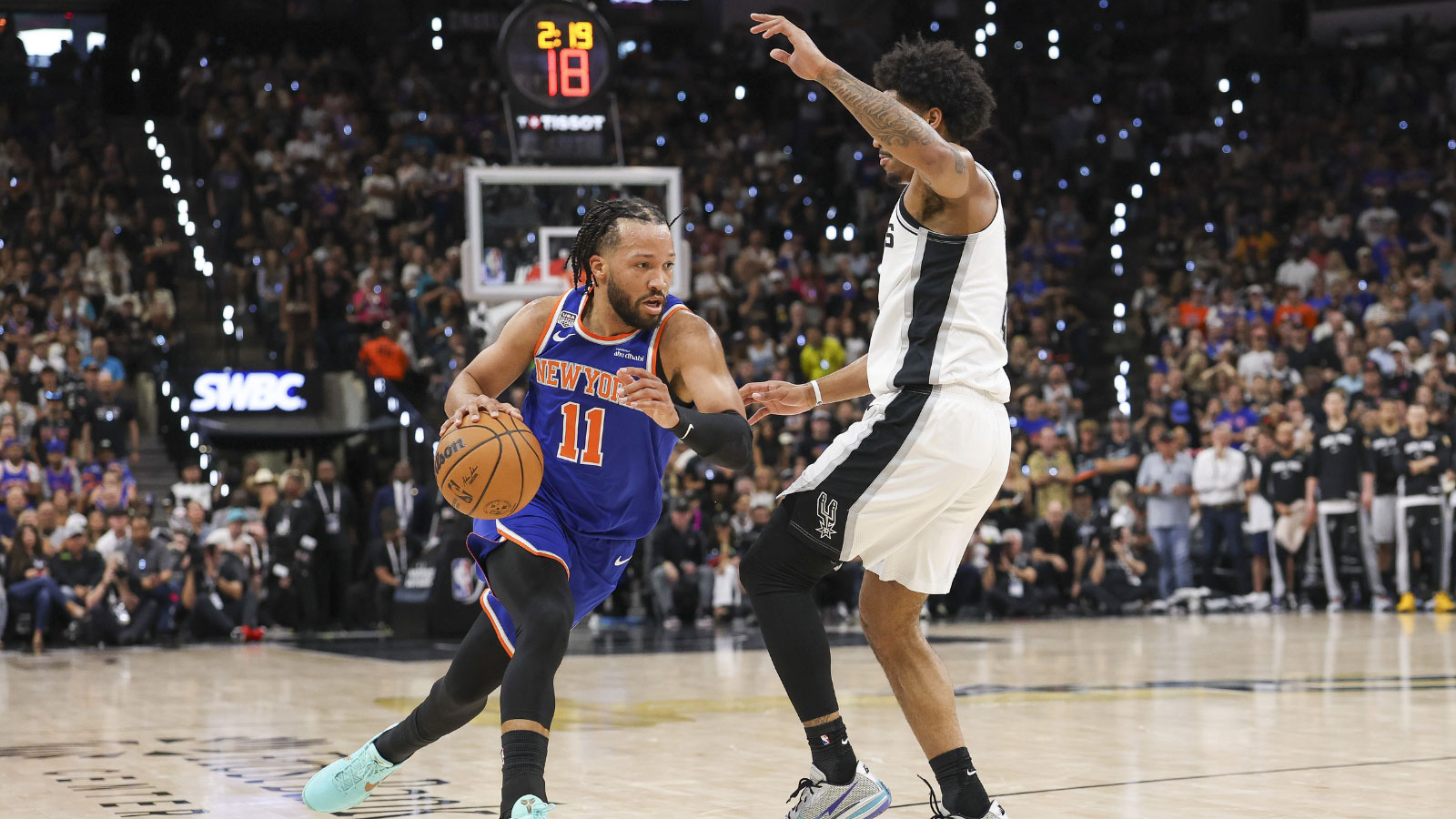 New York Knicks guard Jalen Brunson (11) moves the ball to the basket against the San Antonio Spurs during the first quarter during game five of the 2026 NBA Finals at Frost Bank Center. 