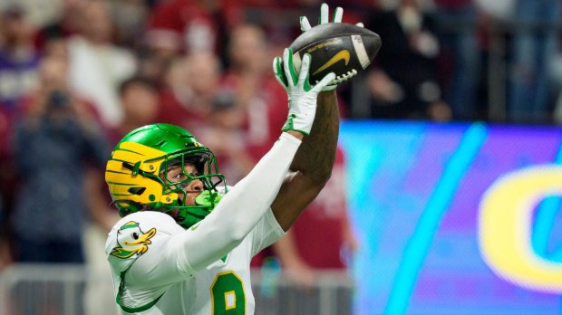 Oregon tight end Jamari Johnson hauls in a touchdown reception as the Oregon Ducks face the Indiana Hoosiers in the Peach Bowl on Jan. 9, 2026, at Mercedes-Benz Stadium in Atlanta, Georgia.