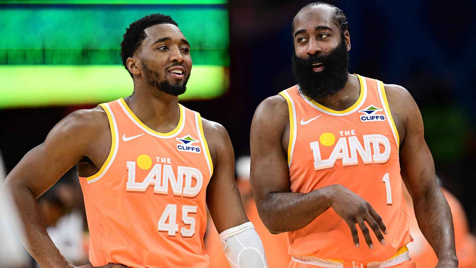 Cleveland Cavaliers guard Donovan Mitchell (45) and guard James Harden (1) talk during a free throw attempt during the second half against the Orlando Magic at Rocket Arena. 