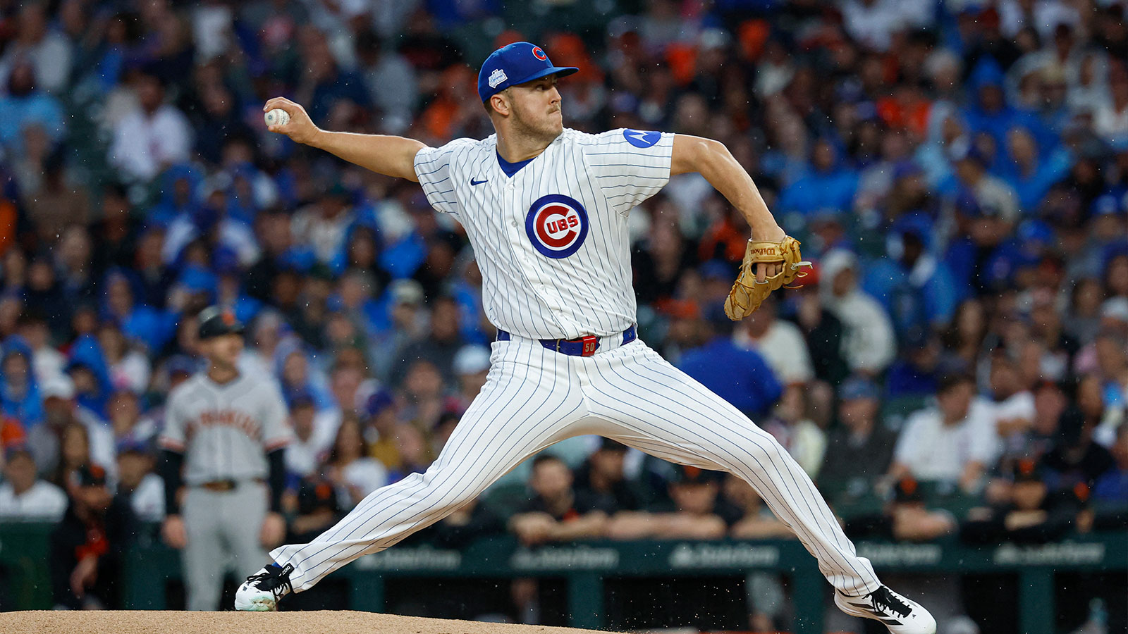 Chicago Cubs starting pitcher Jameson Taillon (50) delivers a pitch against the San Francisco Giants during the first inning at Wrigley Field. 